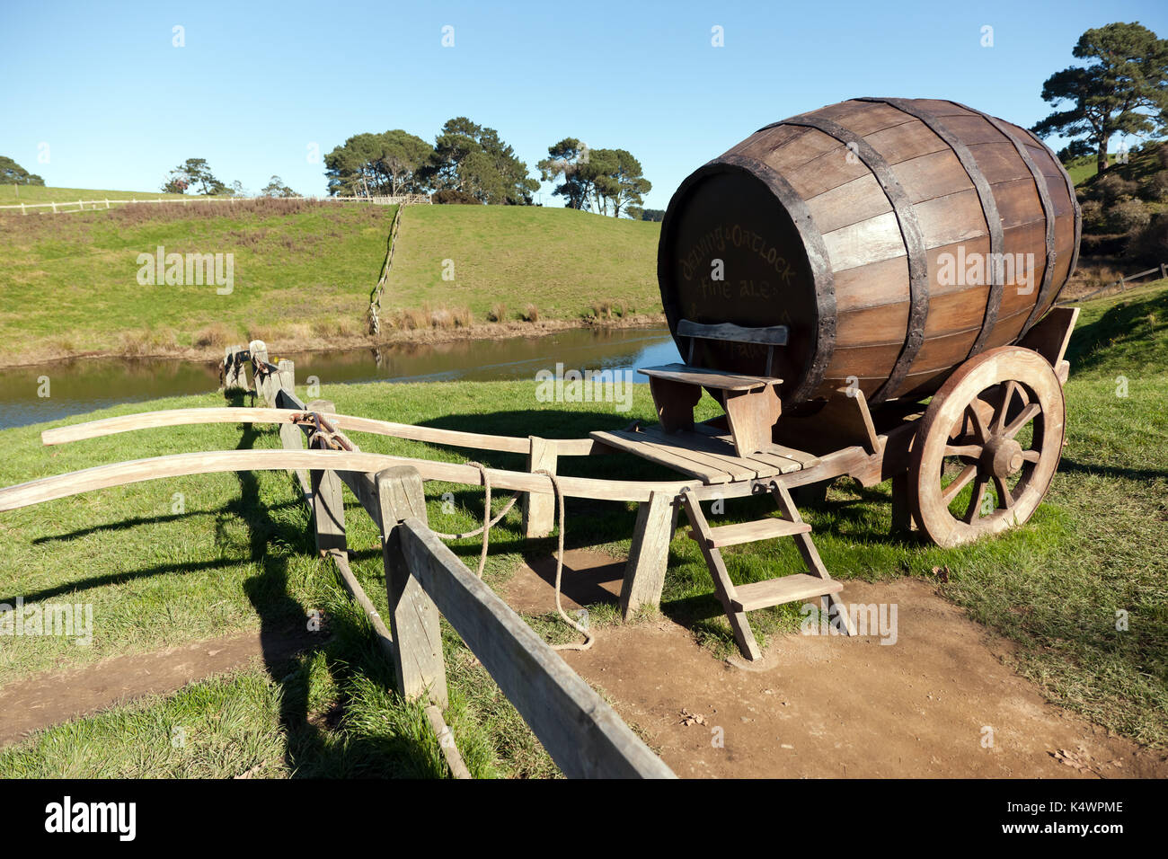 Close-up of a  huge beer barrel cart, Delving & Oatlock - Fine Ale - South Farthing, on the Hobbiton Movie Set, Matamata, Waikato, New Zealand Stock Photo