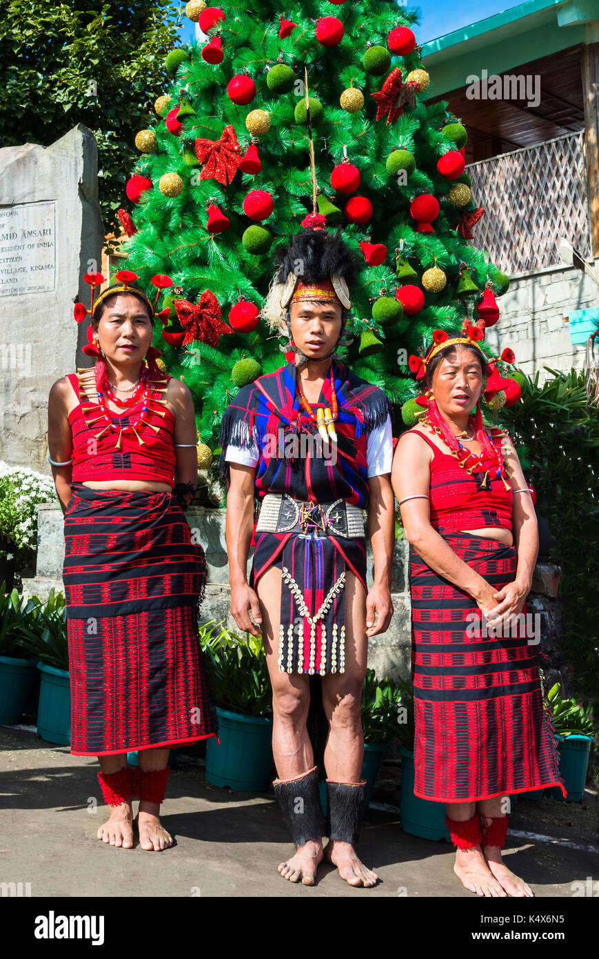Naga tribal group performers standing in line to welcome the Officials ...