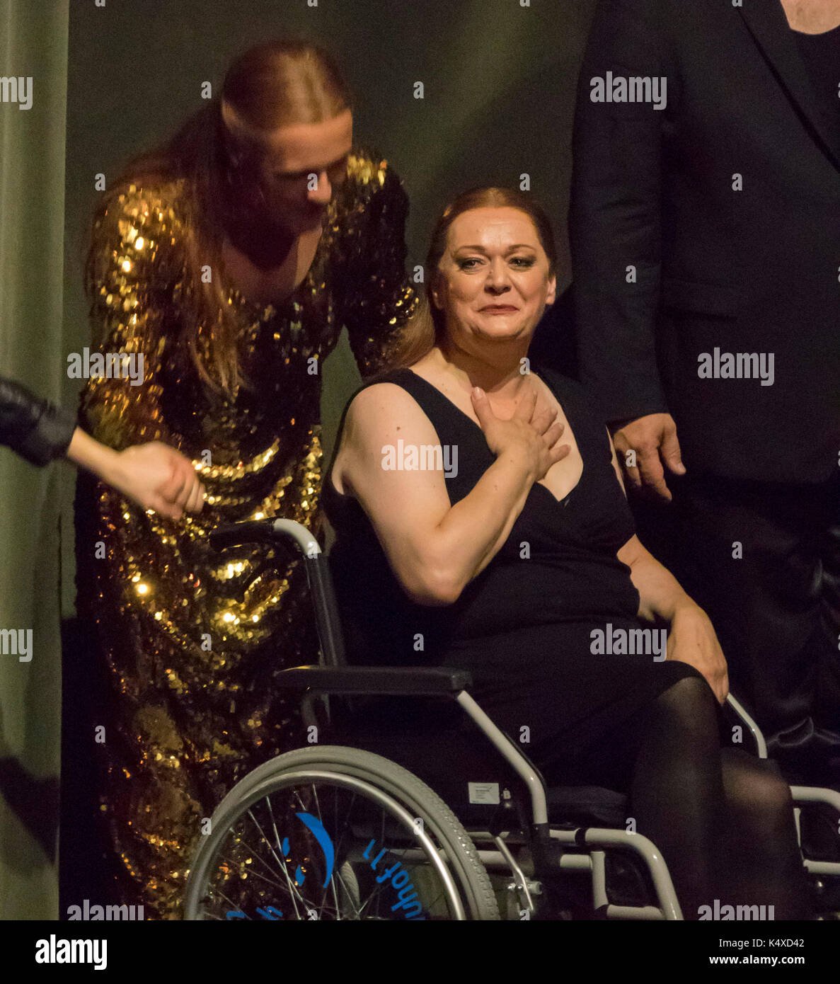 injured Catherine Foster in wheelchair taking a curtain call at Wagner's Gotterdammerung, Bayreuth Opera Festival 2017, Bavaria, Germany Stock Photo