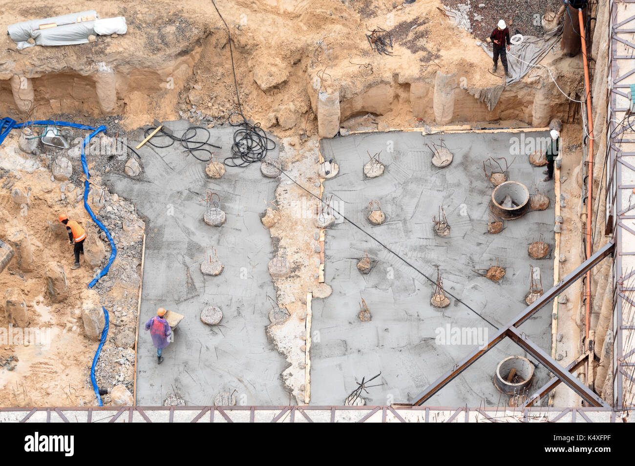 Construction of concrete foundation of new building. Aerial top view of construction site