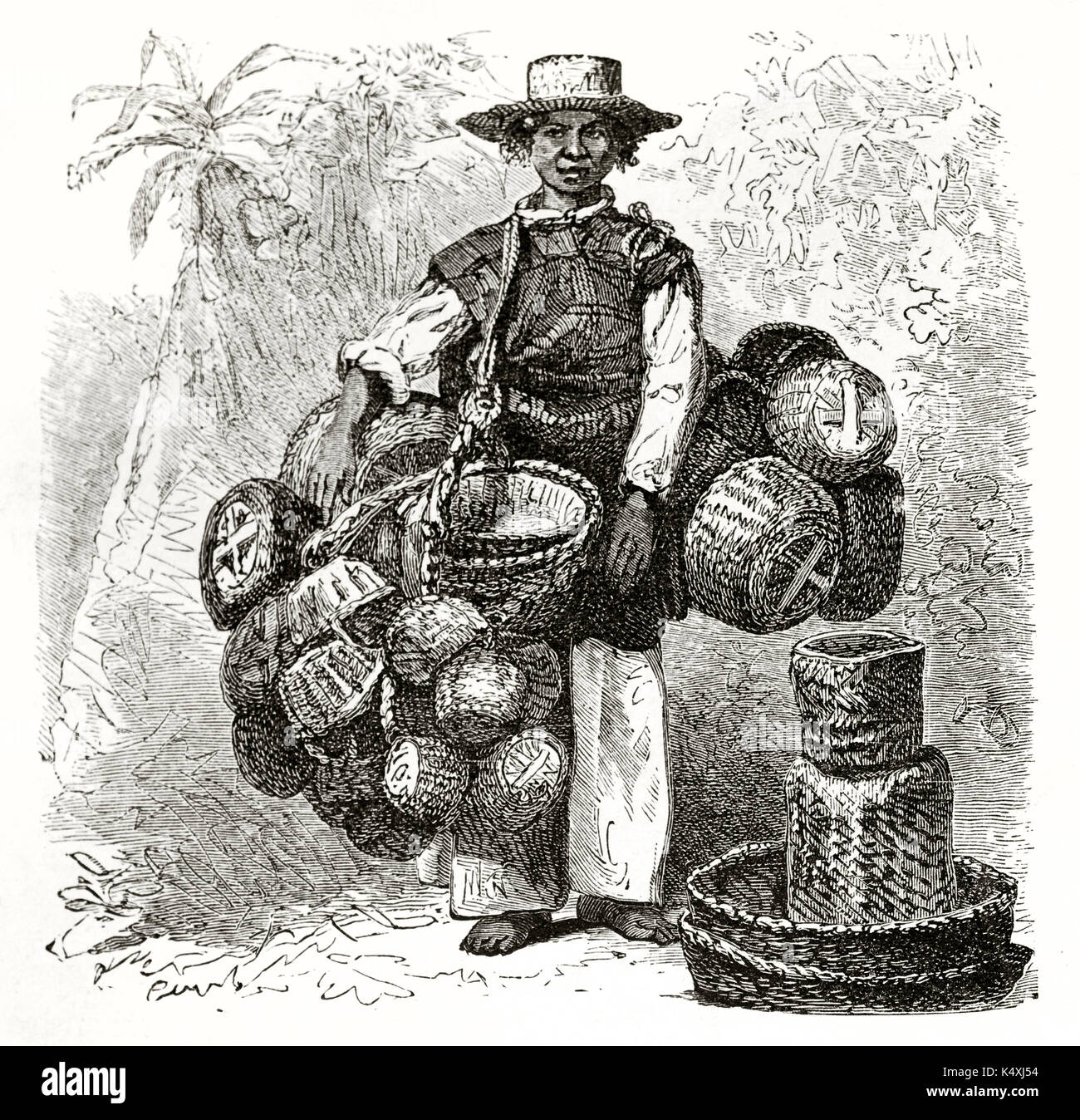 Ancient mexican guy transporting a lot of wicker baskets walking by feet. Old illustration of Mexican basket merchant. Created by Riou and Maurand published on Le Tour du Monde Paris 1862 Stock Photo