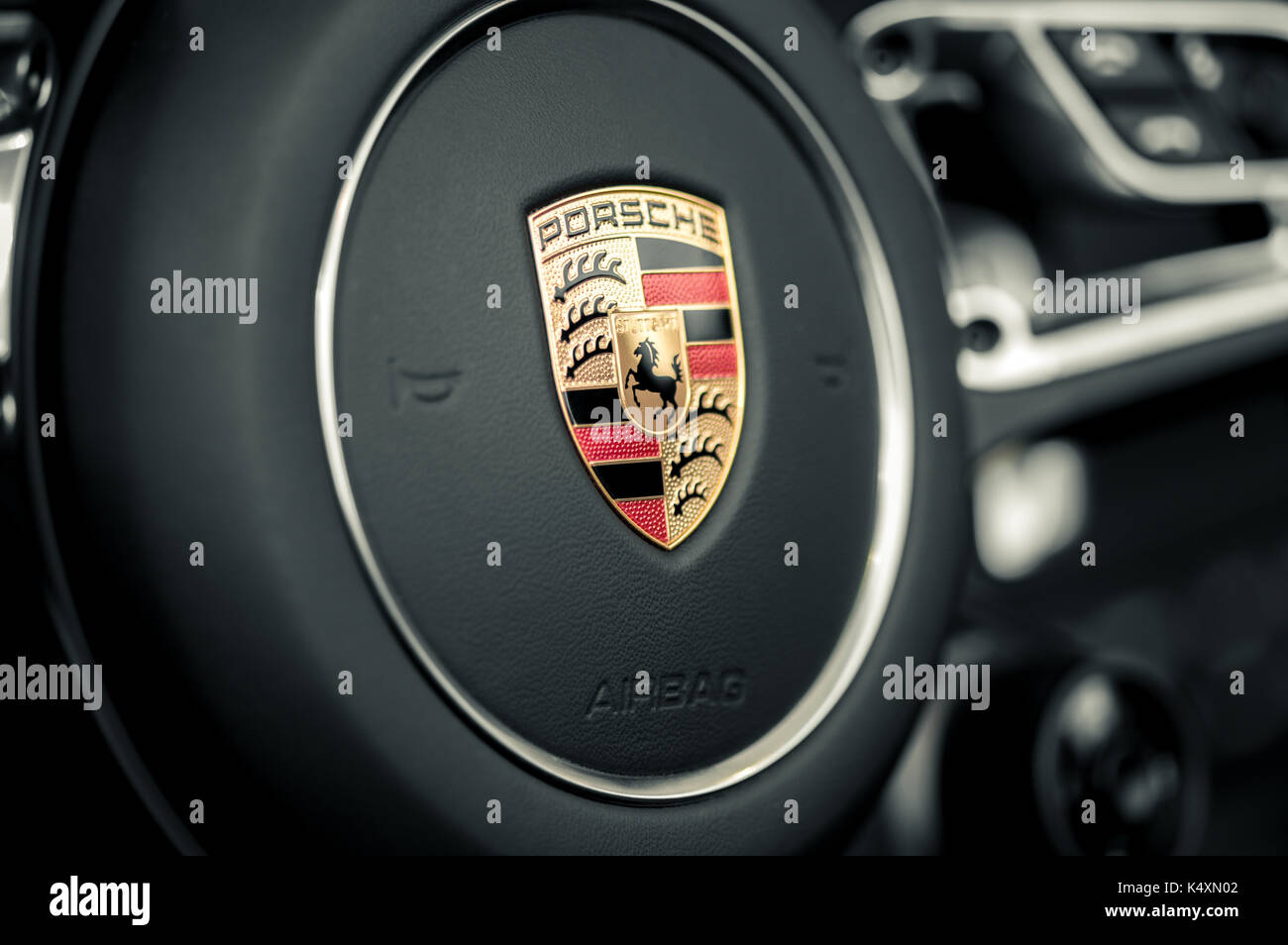 WROCLAW, POLAND -  AUGUST 19th, 2017: Emblem of Porsche on steering wheel. Porsche is a German automobile manufacturer specializing in high-performanc Stock Photo