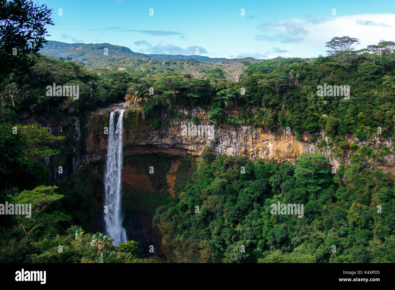 landscape crowned by a large waterfall on Mauritius island Stock Photo