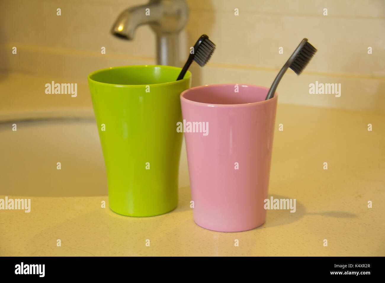 Toothbrush and cups Stock Photo