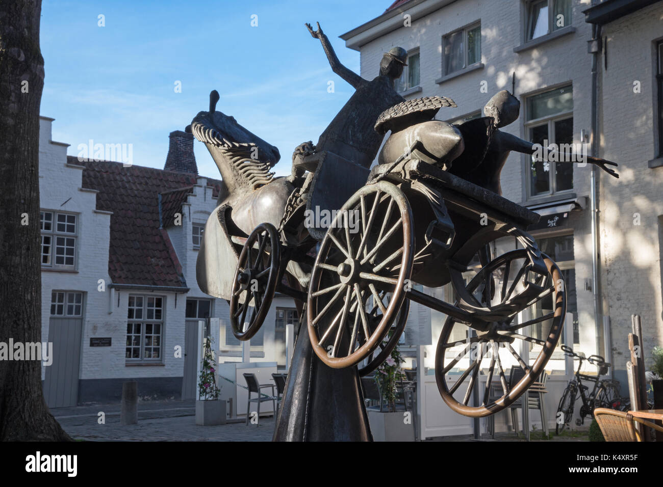 BRUGES, BELGIUM - JUNE 11, 2014: The Zeus, Leda, Prometheus and Pegasus visit Bruges, statue in Walplein by Jef Claerhout (Tielt 1937), Belgian sculpt Stock Photo