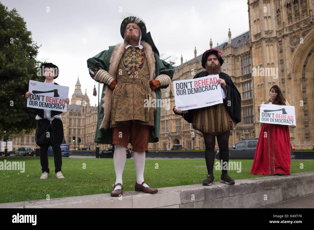 Protesters from the group, Another Europe Is Possible and Global Justice Now dressed as Henry VIII on College Green in London, as the EU Withdrawal Bill is debated in Parliament. Stock Photo