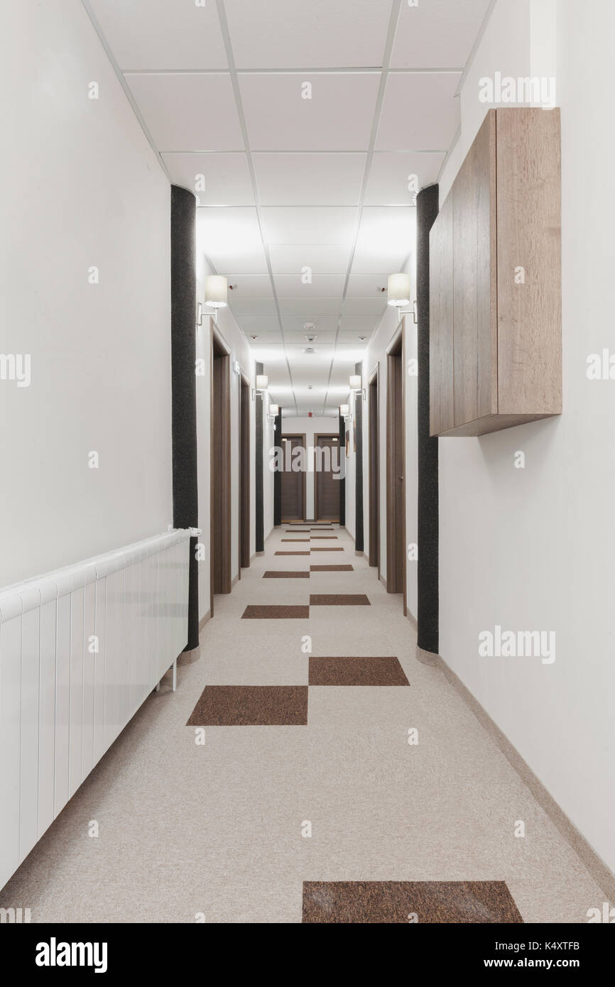 hotel hallway with many doors Stock Photo Alamy