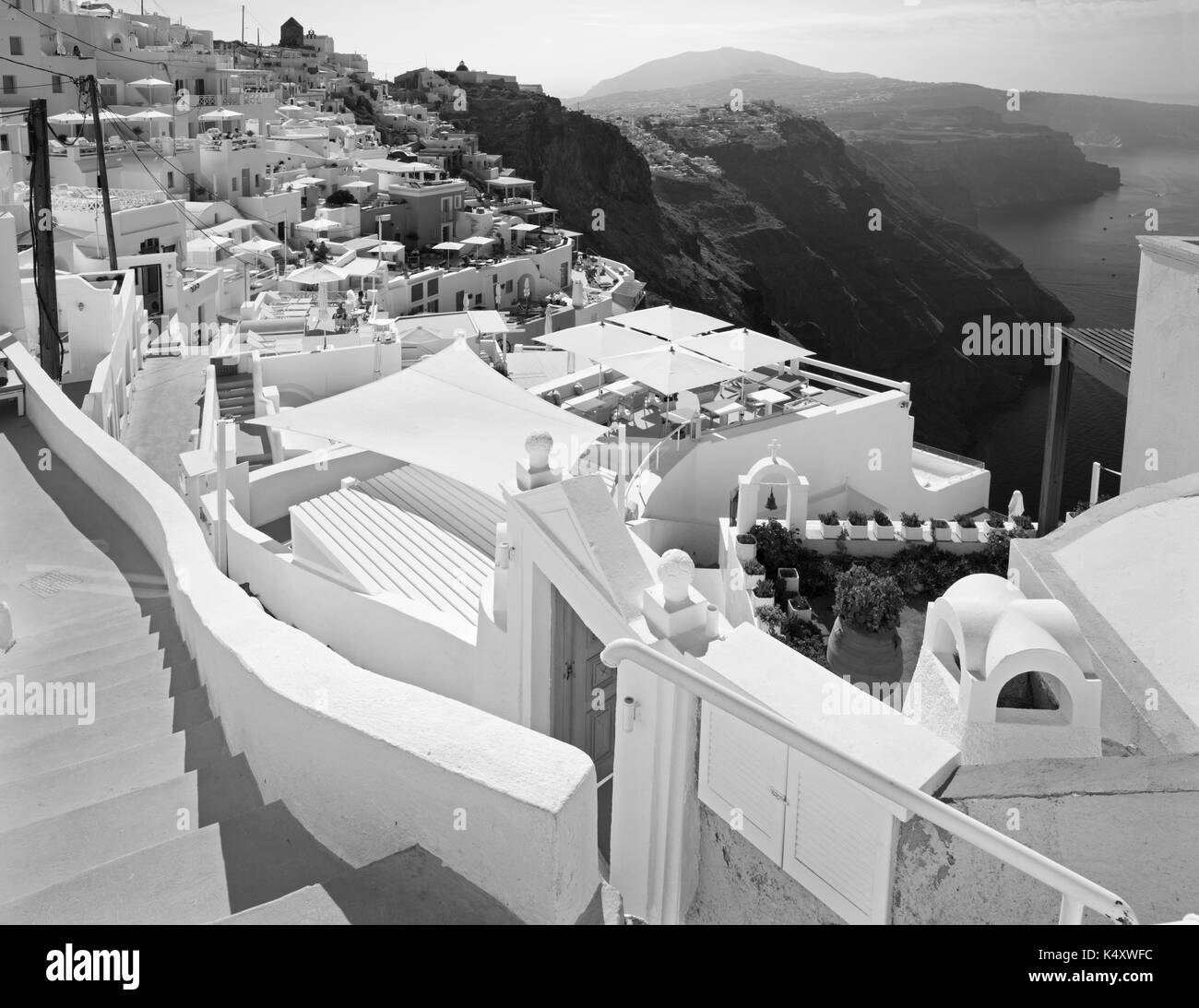 Santorini - The outlook over the luxury resort in Imerovigili to caldera with the Fira in the background. Stock Photo