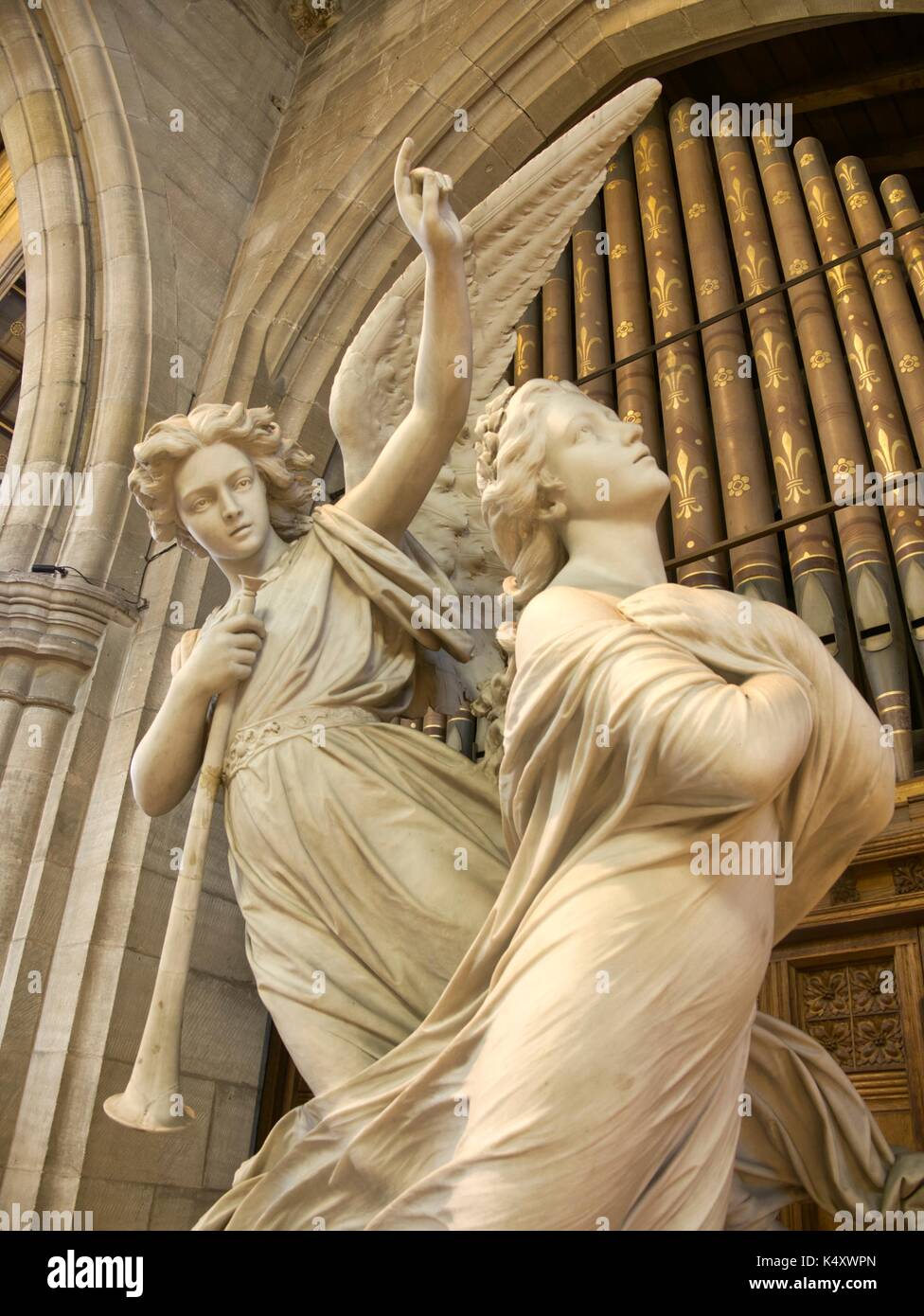 Angel carrying a soul to heaven by Federico Fabiani. Church of All Hallows, Allerton, Liverpool, Noted for its stained glass windows and sculptures. Stock Photo