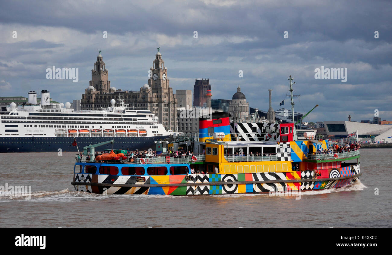 Mersey Ferry in dazzle livery against the backdrop of the Pier Head and Cruiseship Terminal Stock Photo