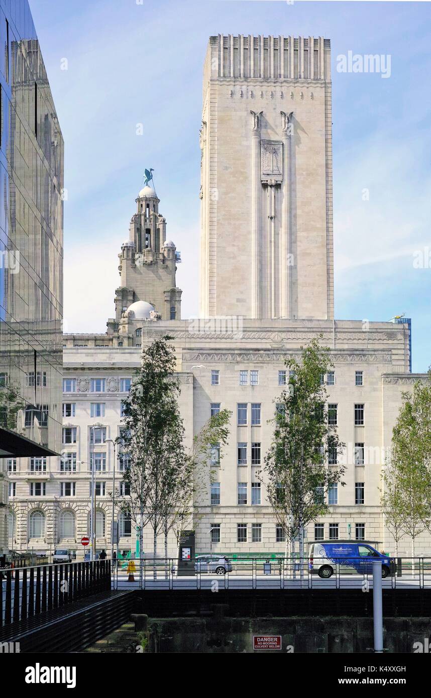 George’s Dock Ventilation and Control Station at junction of the Strand and Mann Island, Liverpool, with Royal Liver Building in background. Stock Photo