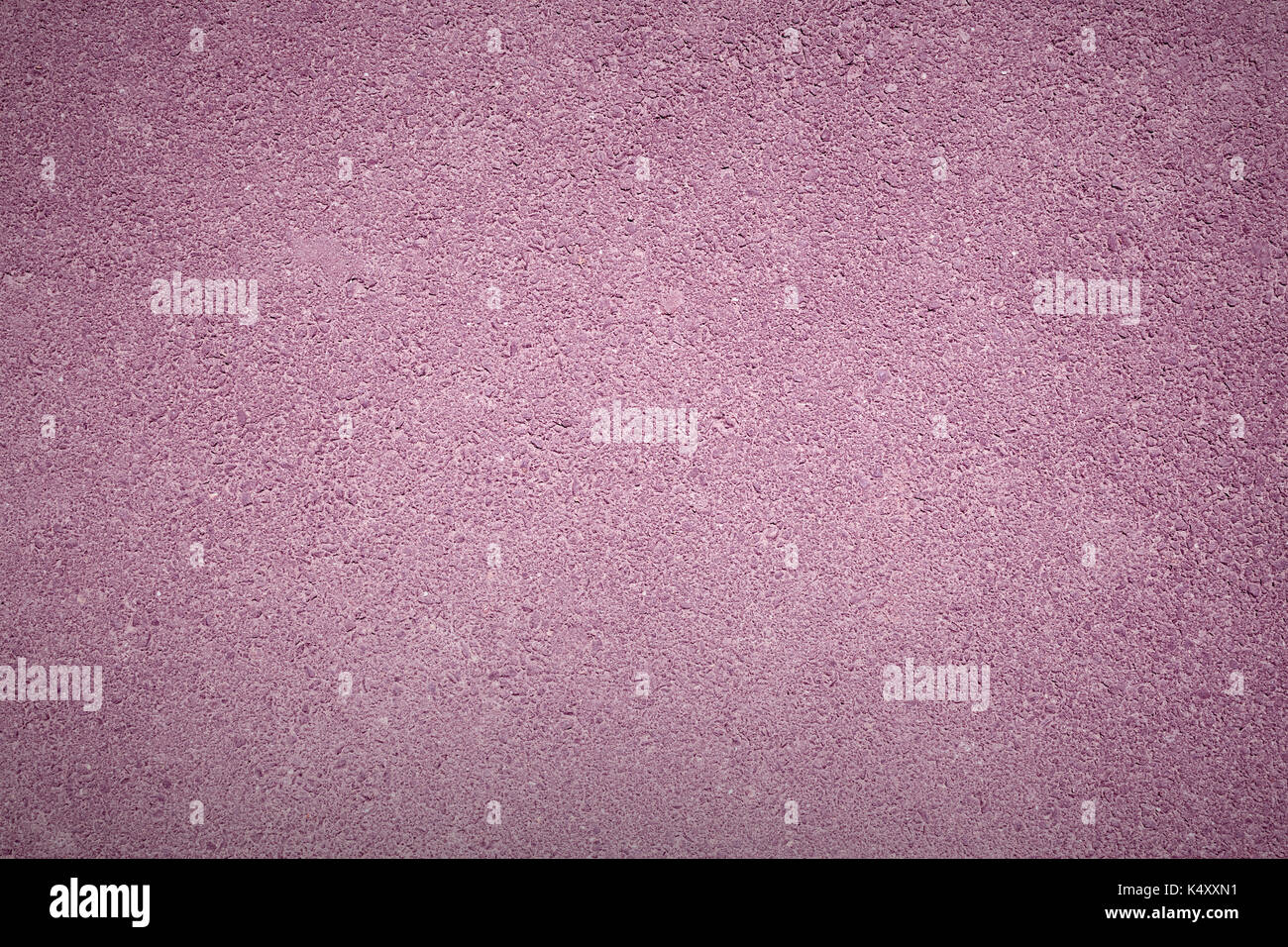 Lilac background texture of rough asphalt, top view Stock Photo