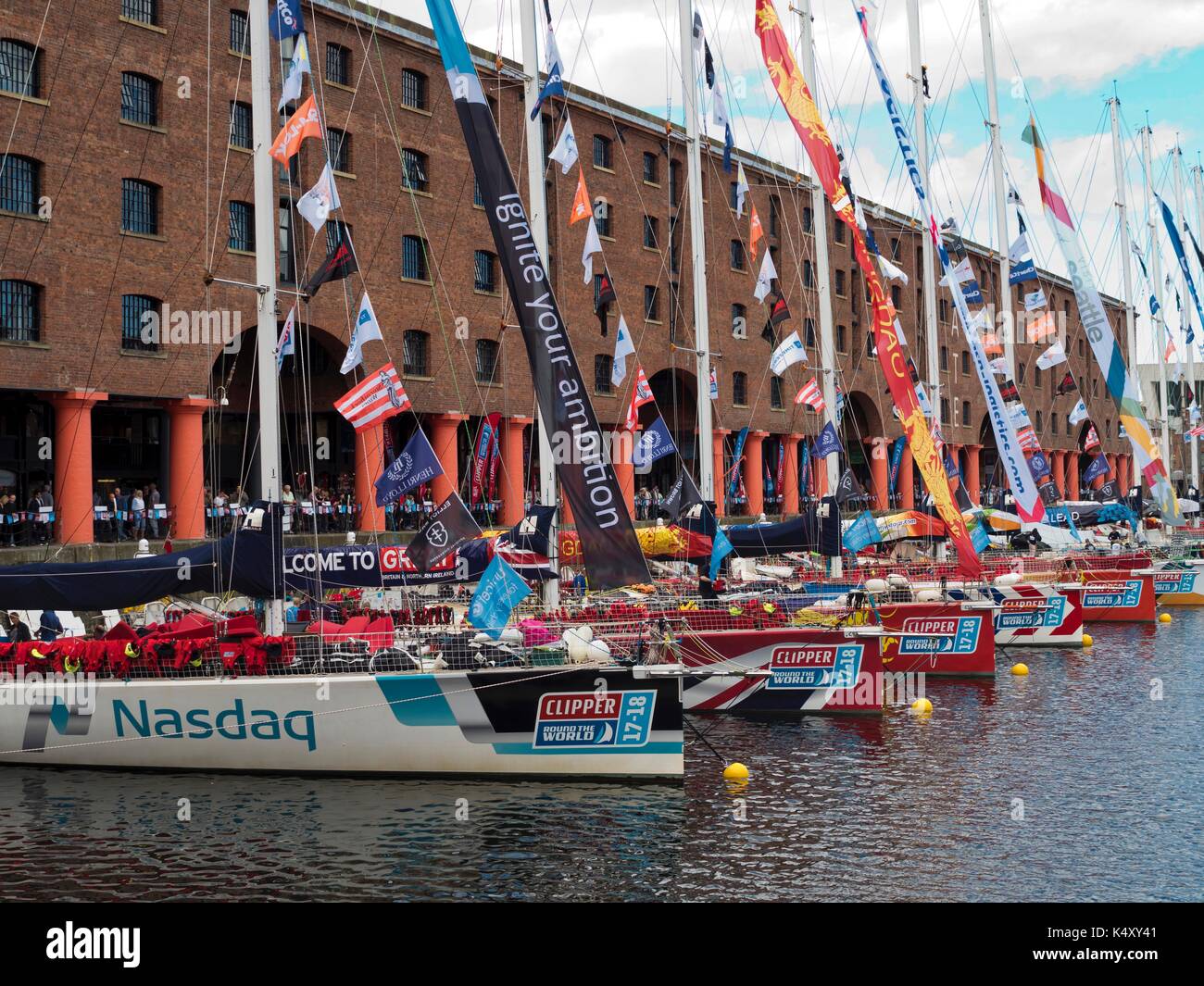 Yachts competing in the 2017 Clipper Race before the start at Albert Dock, Liverpool. The Nasdaq sponsored yacht is in the foreground. Stock Photo
