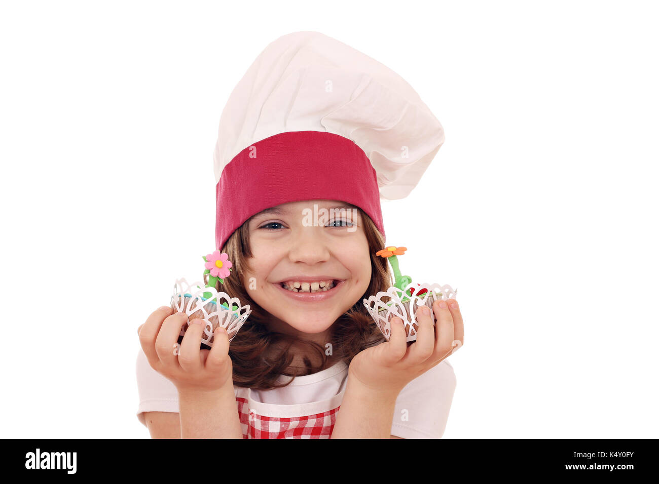 happy little girl cook with spring flower muffin Stock Photo Alamy