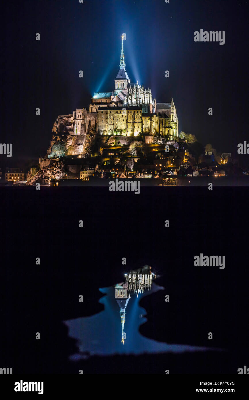 Mont Saint-Michel (Saint Michael's Mount), Normandy, north-western France: the mount lit up at night Stock Photo