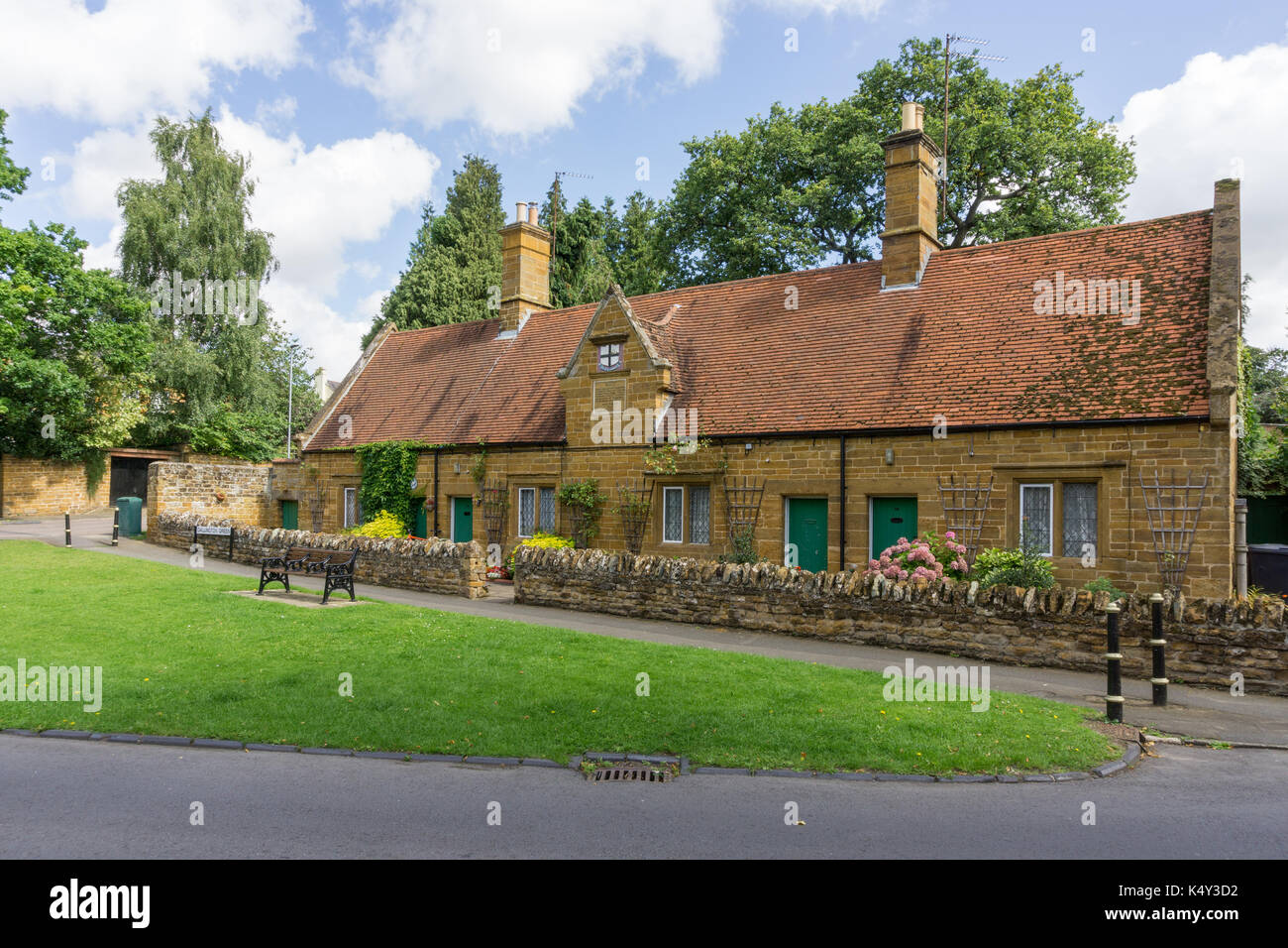 Raynsford Almshouses dating from 1673 in the village of Dallington, Northampton, UK; now residential accommodation for the elderly Stock Photo