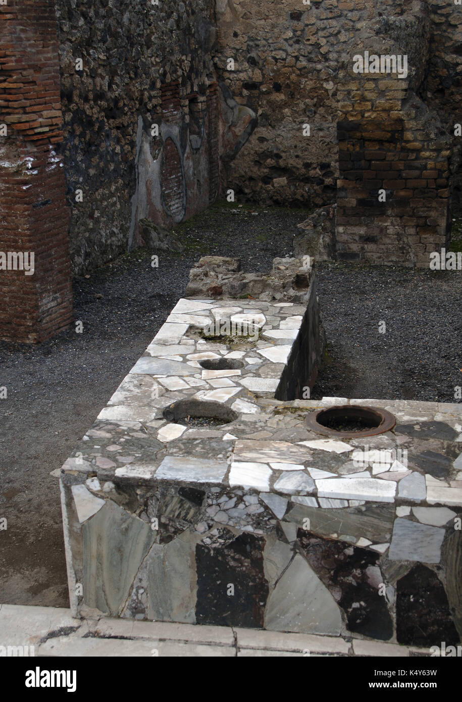Italy. Pompeii. Marble covered counter Thermopolium. Campania. Stock Photo