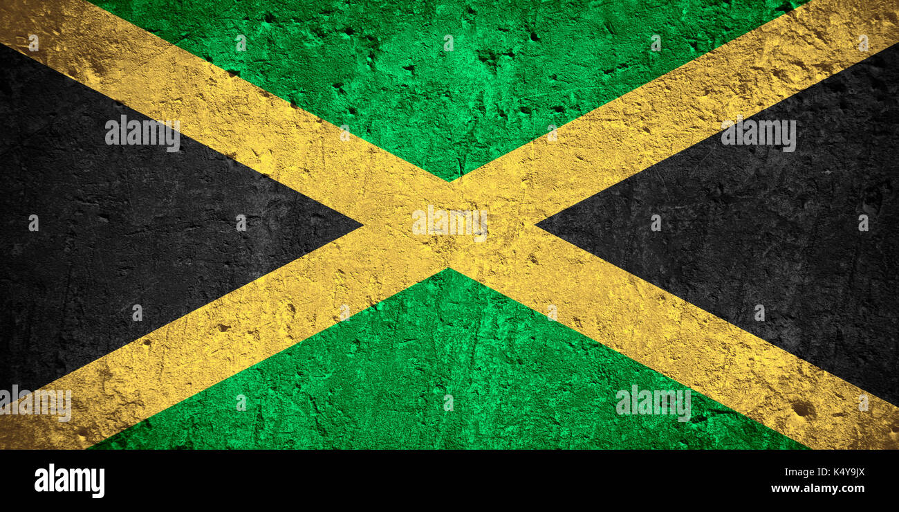 flag of Jamaica or Jamaican flag on scratched rough texture Stock Photo