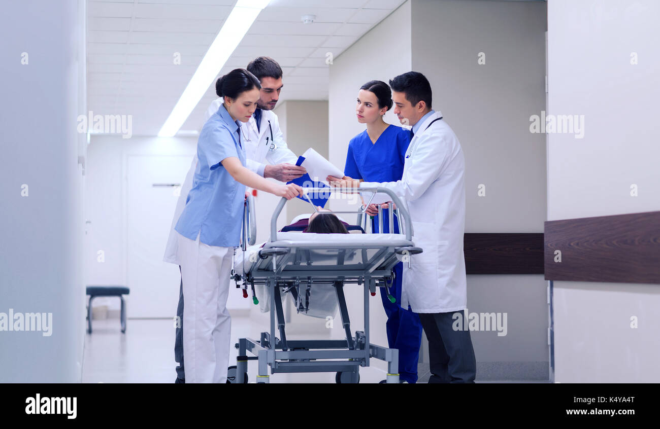 Injured woman on stretcher hi-res stock photography and images - Alamy