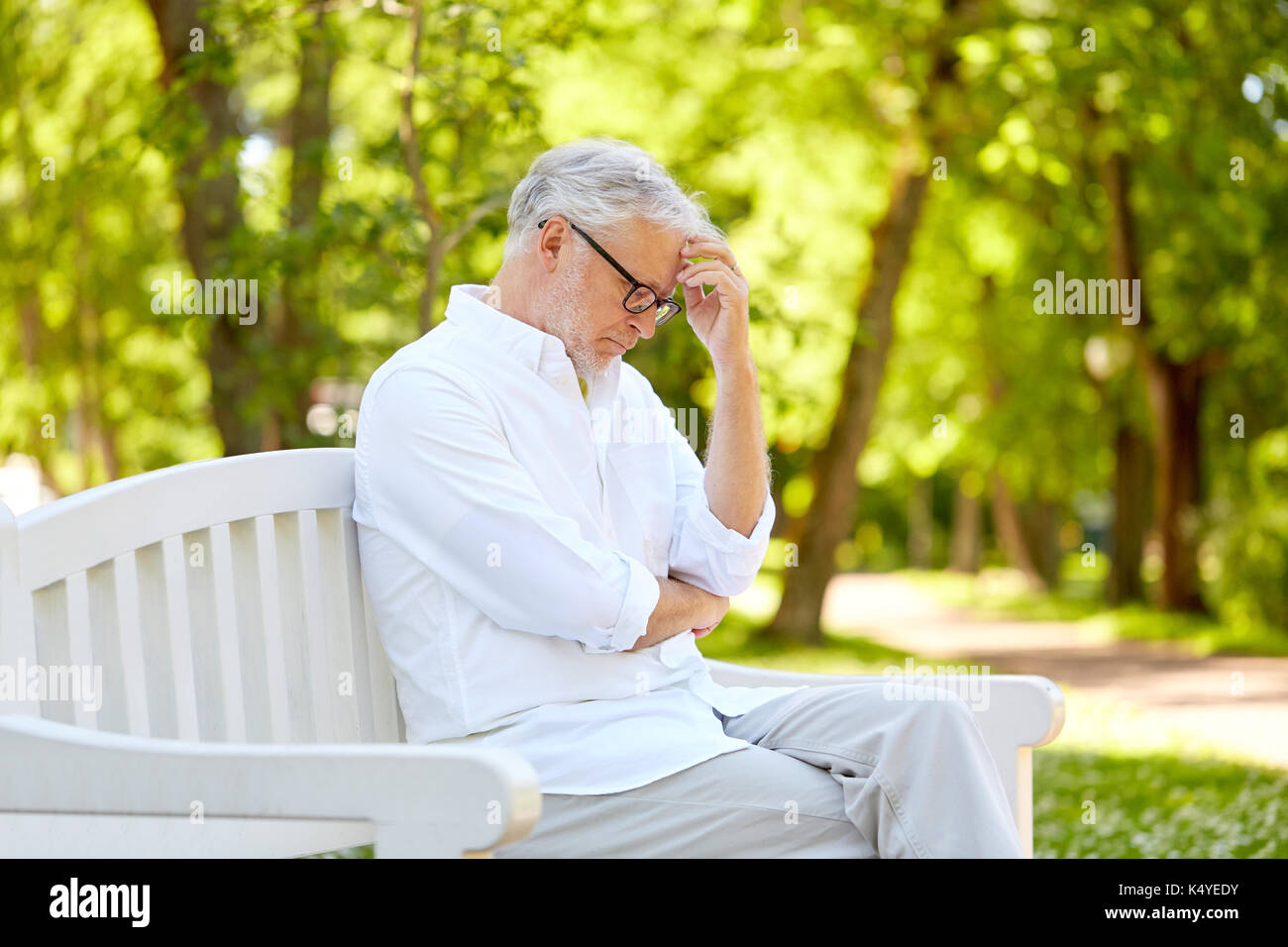 Pensive worried old man sitting hi-res stock photography and images - Alamy