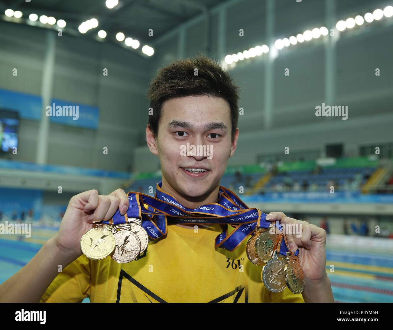 Tianjin. 7th Sep, 2017. Sun Yang of Zhejiang shows all his medals after the awarding ceremony of men's 4x100m medley relay final at 13th Chinese National Games in north China's Tianjin Municipality, Sept. 7, 2017. Sun Yang won six gold medals and one silver medal at 13th Chinese National Games. Credit: Fei Maohua/Xinhua/Alamy Live News Stock Photo