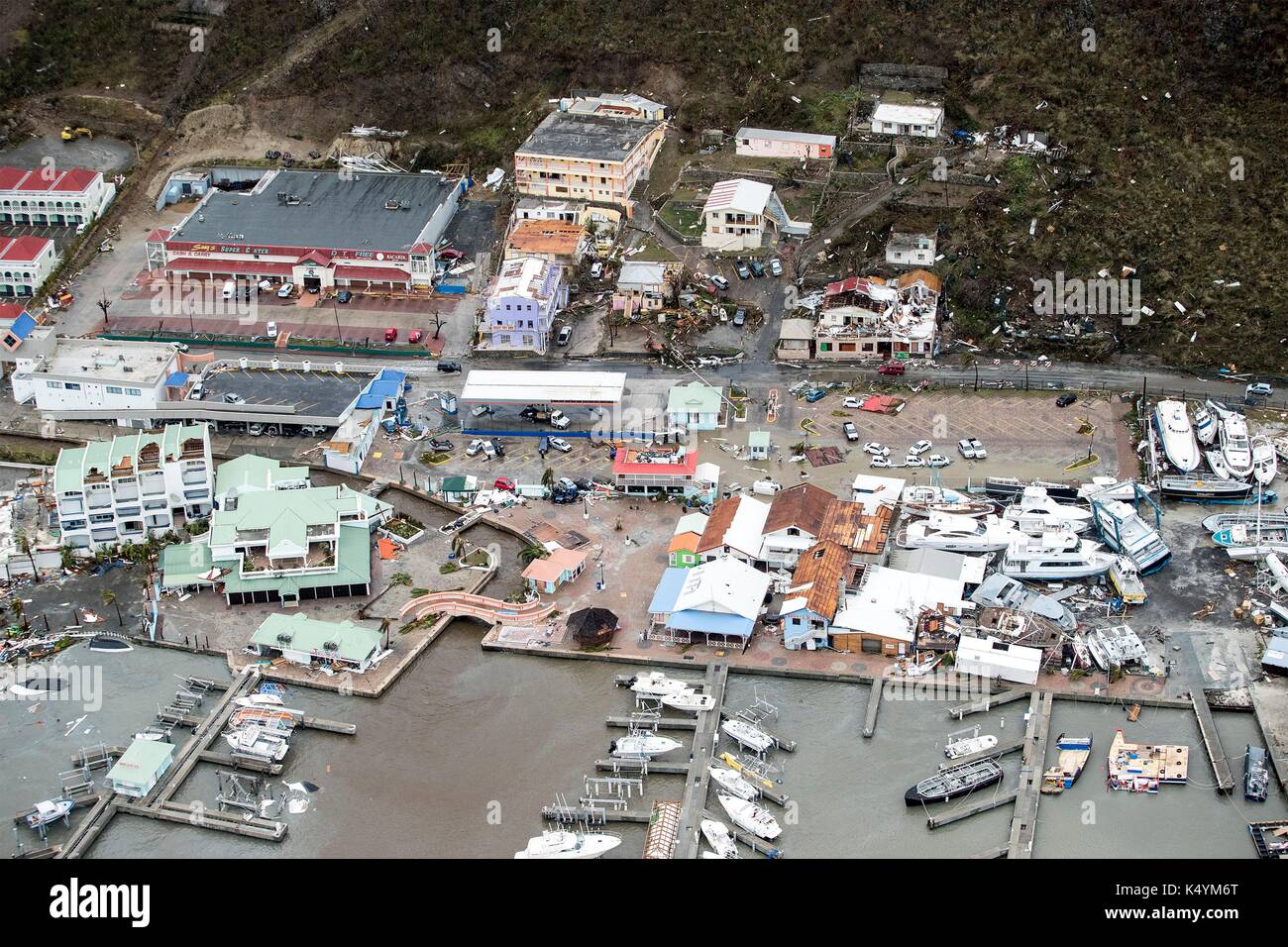 Philipsburg, St Maarten. 06th Sep, 2017. Massive destruction of the port and buildings in the wake of a direct hit by Hurricane Irma, a Category 5 storm lashing the Caribbean September 6, 2017 in Philipsburg, St. Maarten. Imra is packing winds of 185-mph making it the strongest hurricane ever recorded in the Atlantic Ocean. (Gerben Van Es/Netherlands Defence Ministry via Planetpix) Stock Photo