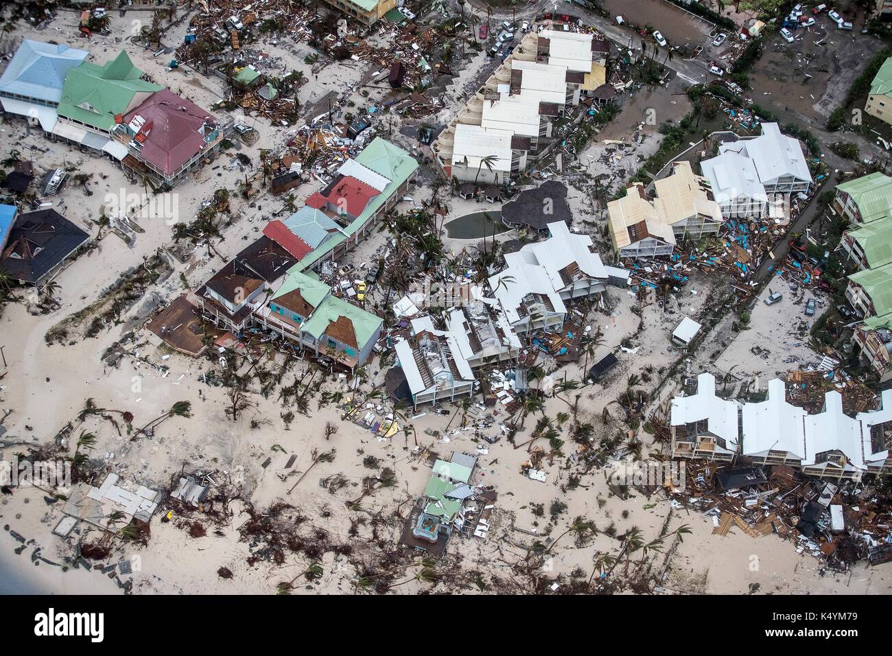Philipsburg, St Maarten. 06th Sep, 2017. Massive destruction to a resort on the Dutch island of St Maarten in the wake of a direct hit by Hurricane Irma, a Category 5 storm lashing the Caribbean September 6, 2017 in Philipsburg, St. Maarten. Imra is packing winds of 185-mph making it the strongest hurricane ever recorded in the Atlantic Ocean. (Gerben Van Es/Netherlands Defence Ministry via Planetpix) Stock Photo