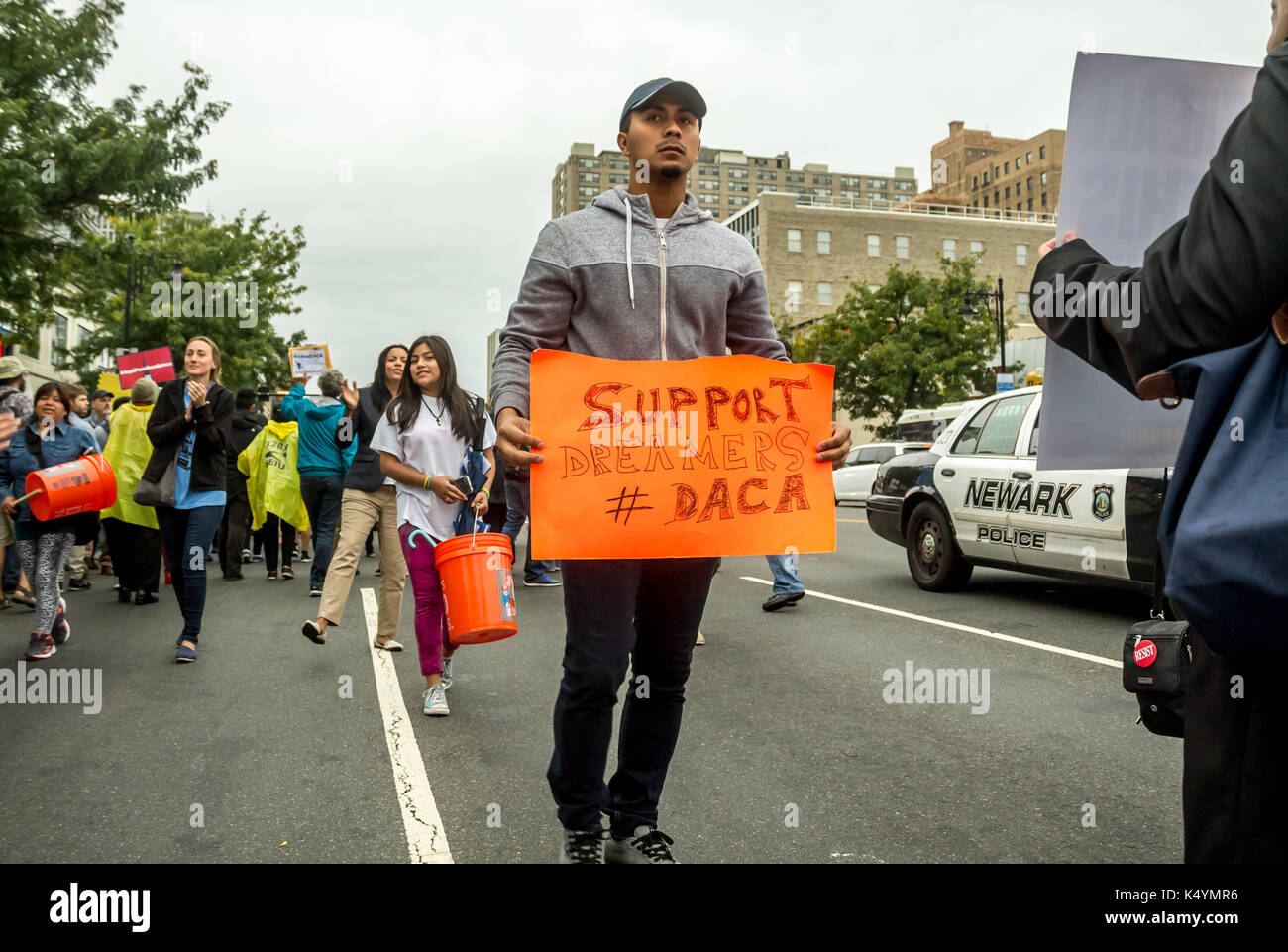 Newark, United States. 6th September, 2017. Immigrants and their supporters take to the streets to protest President Donald Trump's removal of DACA, an Obama era legislation that allows those who immigrated as children to remain in the USA on a special visa. Almost 800,000 people are under threat of deportation now that DACA is gone. Most of those threatened with deportation are students who have been living inside the country for years via the 'Dreamers' act. Mack William Regan / Alamy Live News Stock Photo