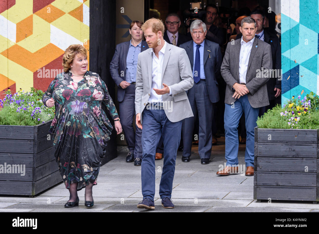 Belfast, Northern Ireland. 07/09/2017 -  Prince Harry leaves the MAC with Lord Lieutenant of the City of Belfast, Fionnula Jay-O'Boyle, before a walkabout in Belfast on his first Northern Ireland visit. Stock Photo