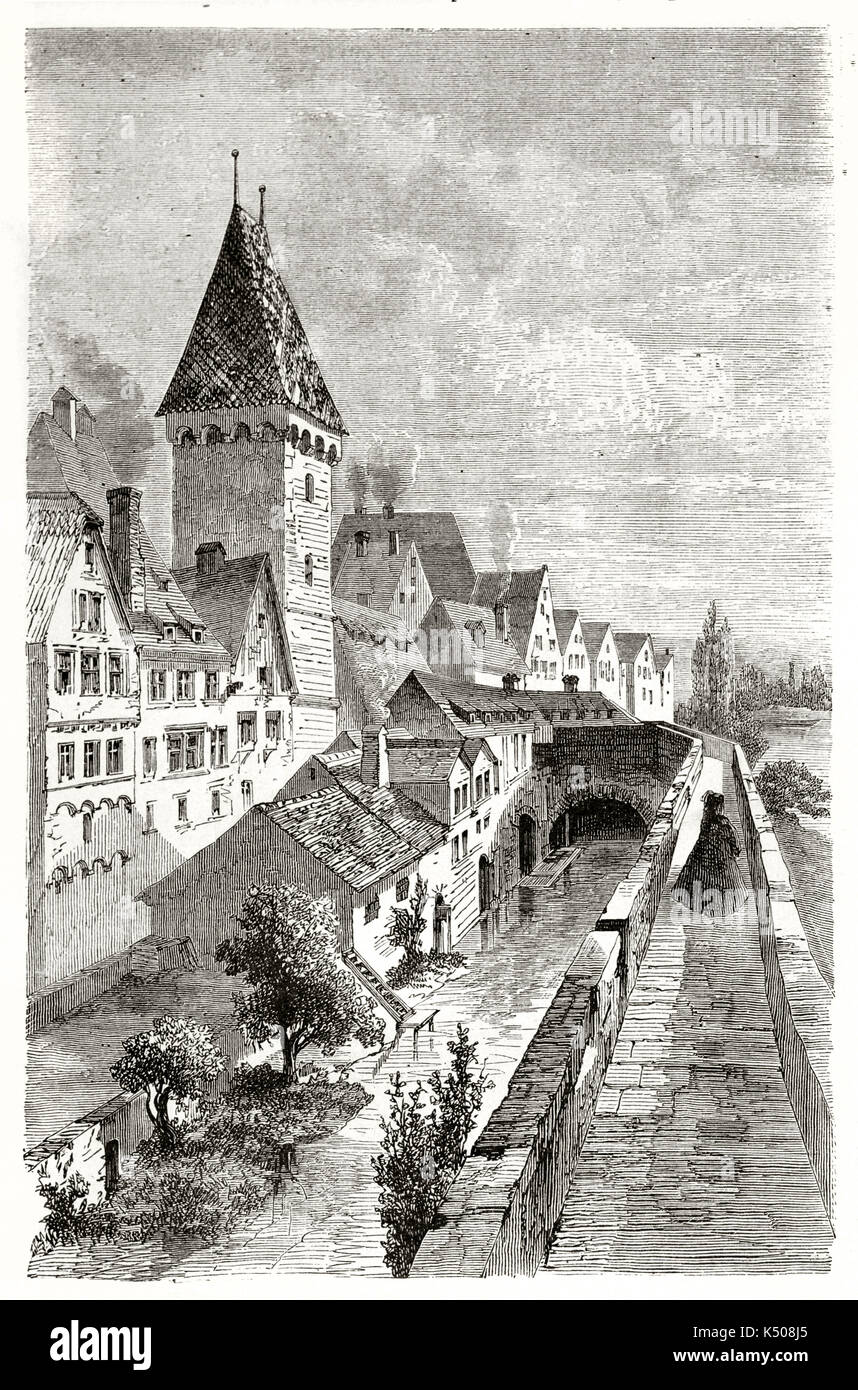 Foreshortening of an ancient medieval city. Old view of Ulm moat Germany. Created by Lancelot published on Le Tour du Monde Paris 1862 Stock Photo