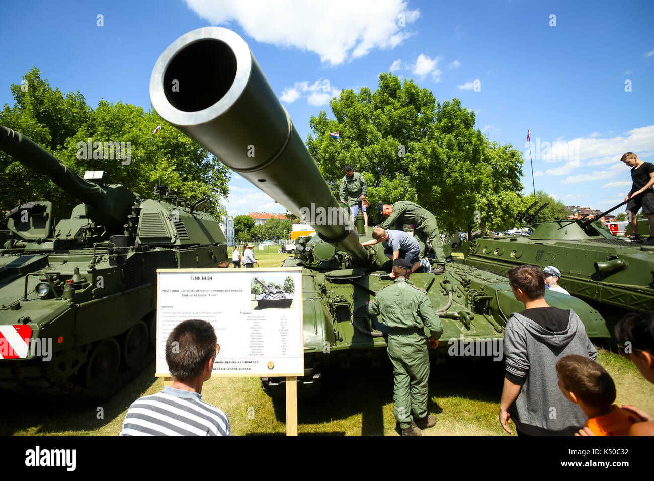 ZAGREB, CROATIA - MAY 28, 2017 : People sightseeing tank M 84 exposed at 26th anniversary of the formation of the Croatian Armed Forces on Lake Jarun Stock Photo