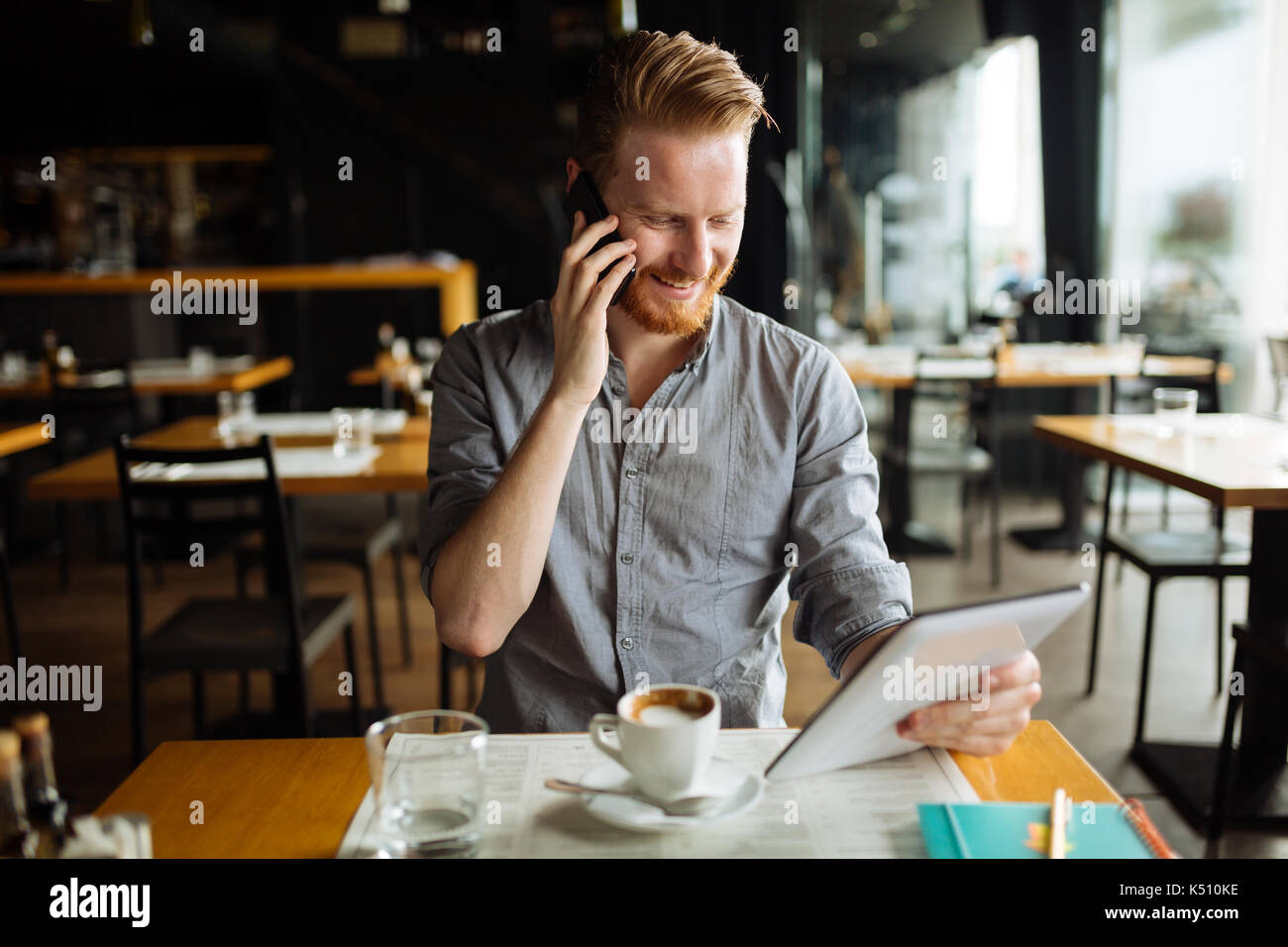Businessman constantly working Stock Photo