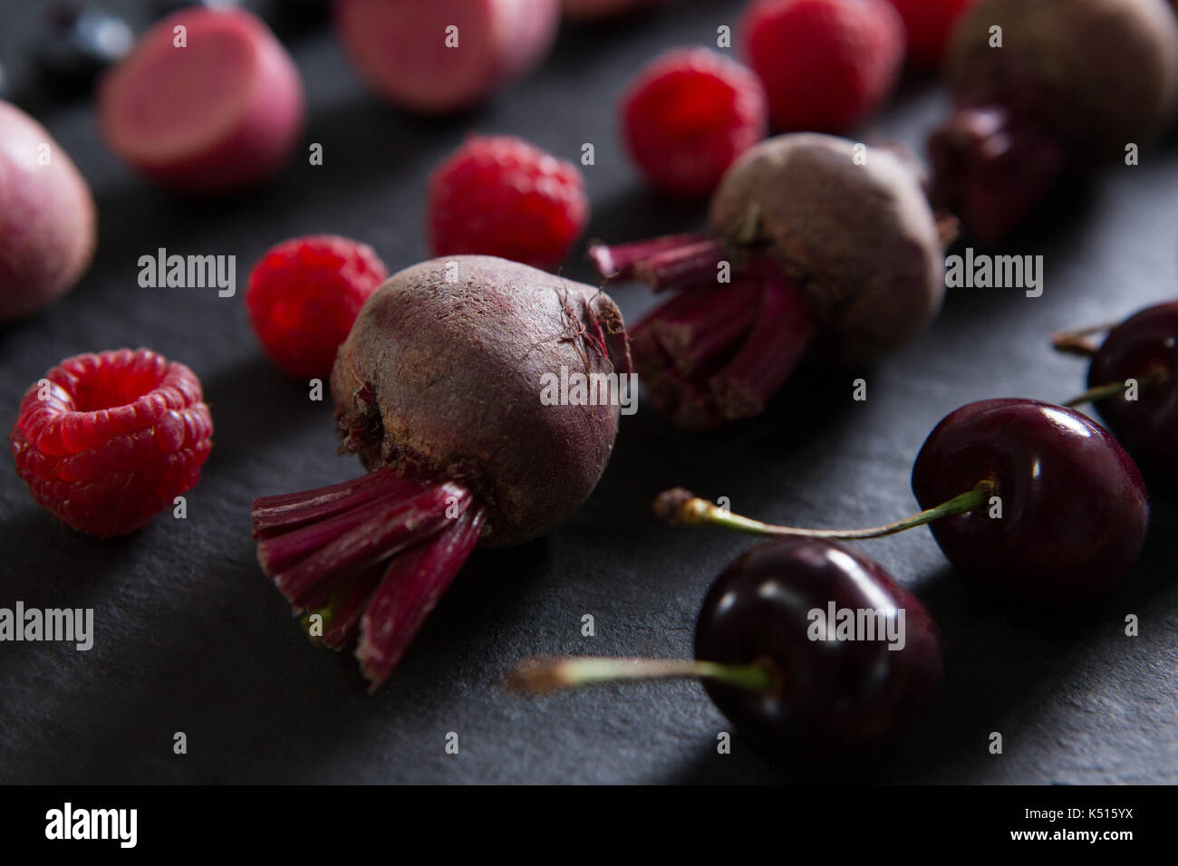 Close-up of fruits and vegetables on chopping board Stock Photo