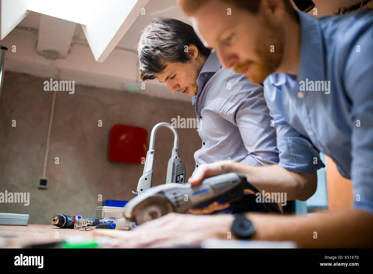 Two designers working together Stock Photo - Alamy