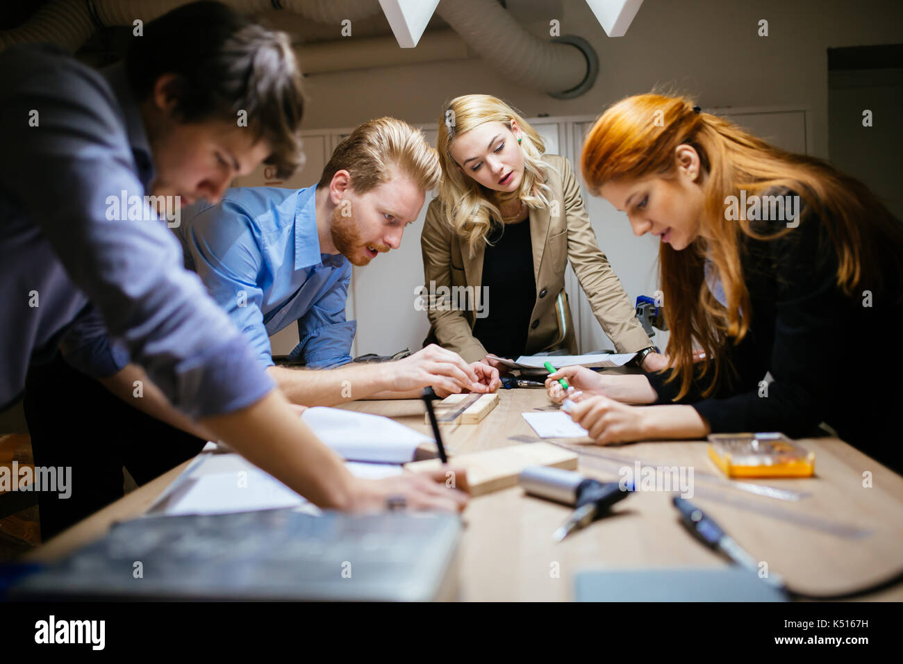 Classmates working on a project together Stock Photo