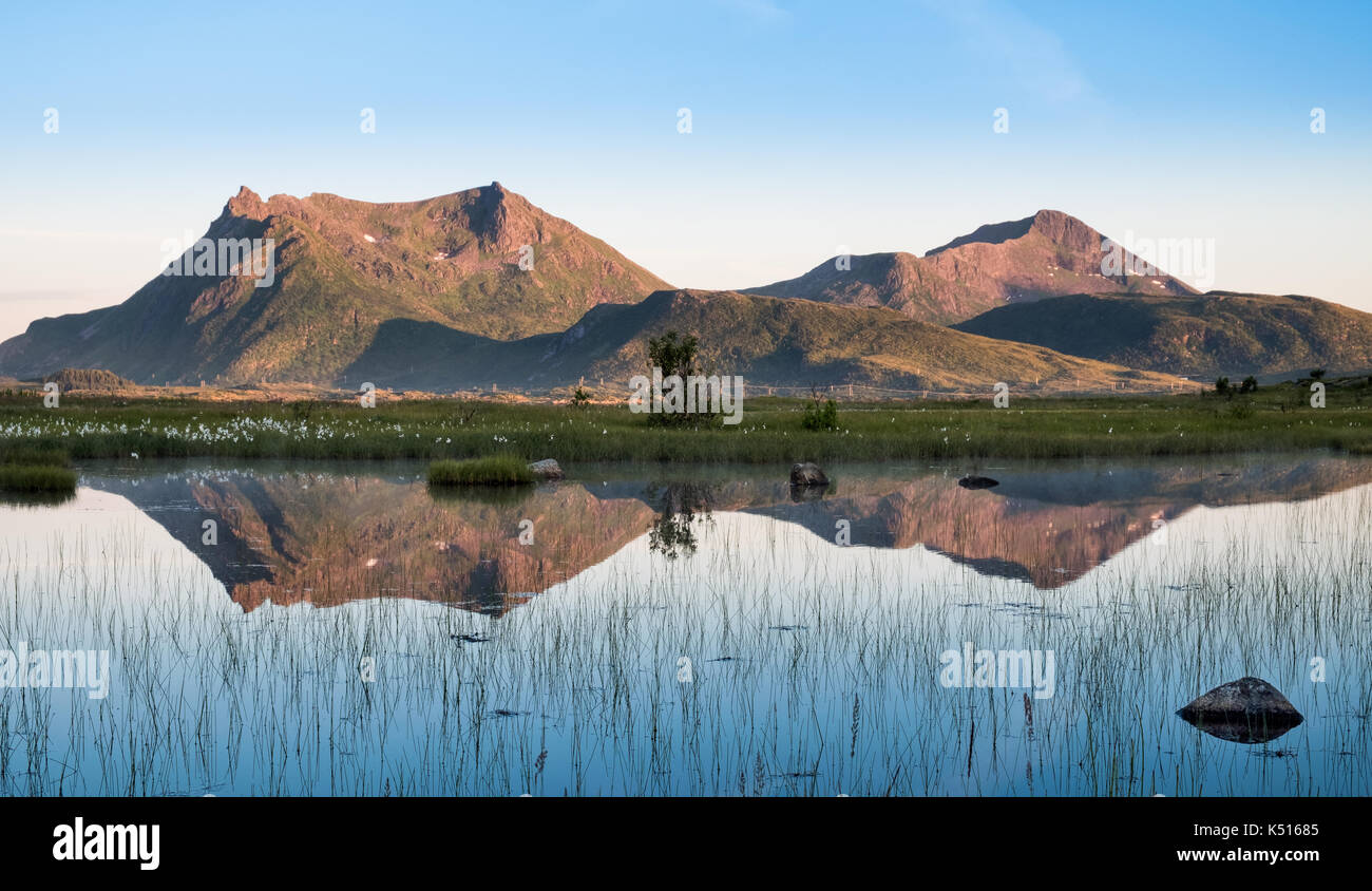 Scenic mountain landscape with nice reflection at bright summer day in Lofoten, Norway Stock Photo