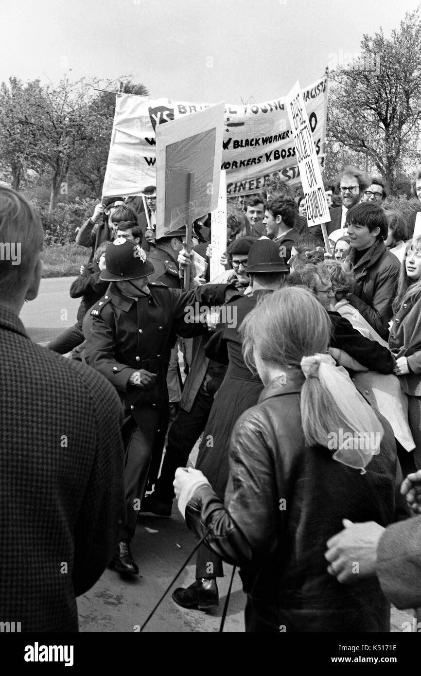 Enoch Powell protest:  Police push back demonstrators to clear a way for  Enoch Powell MP three weeks after his controversial speech on immigration that became known as the “rivers of blood” speech.  He had driven to a public meeting in Chippenham in Wiltshire on 11 May 1968 to find anti-racism students from Bristol University picketing the gates. Stock Photo