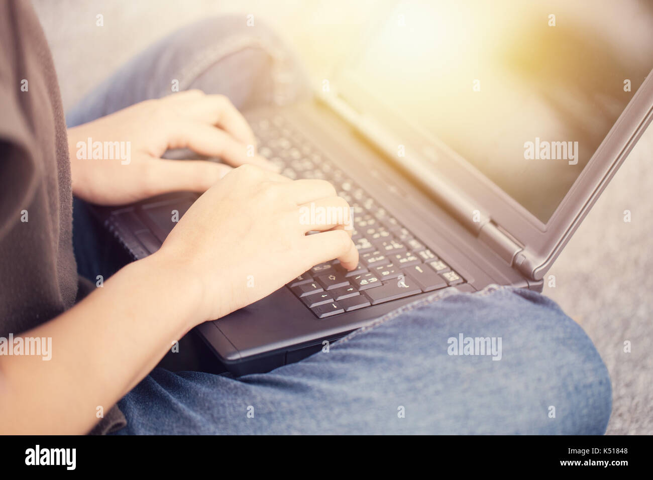 finger at laptop keyboard. working lifestyle, closeup business woman typing on computer. Stock Photo