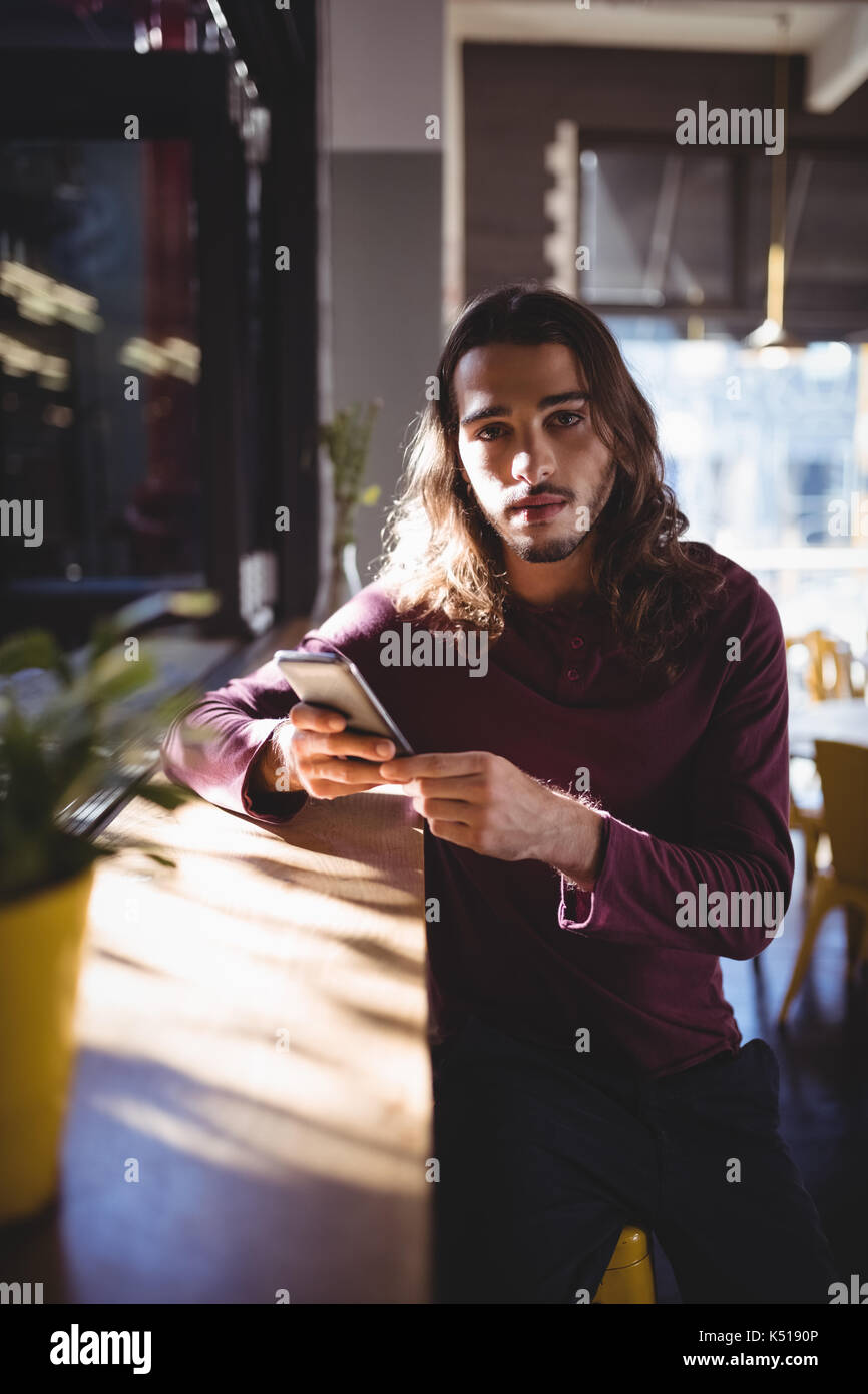 Handsome young man long hair hi-res stock photography and images - Alamy
