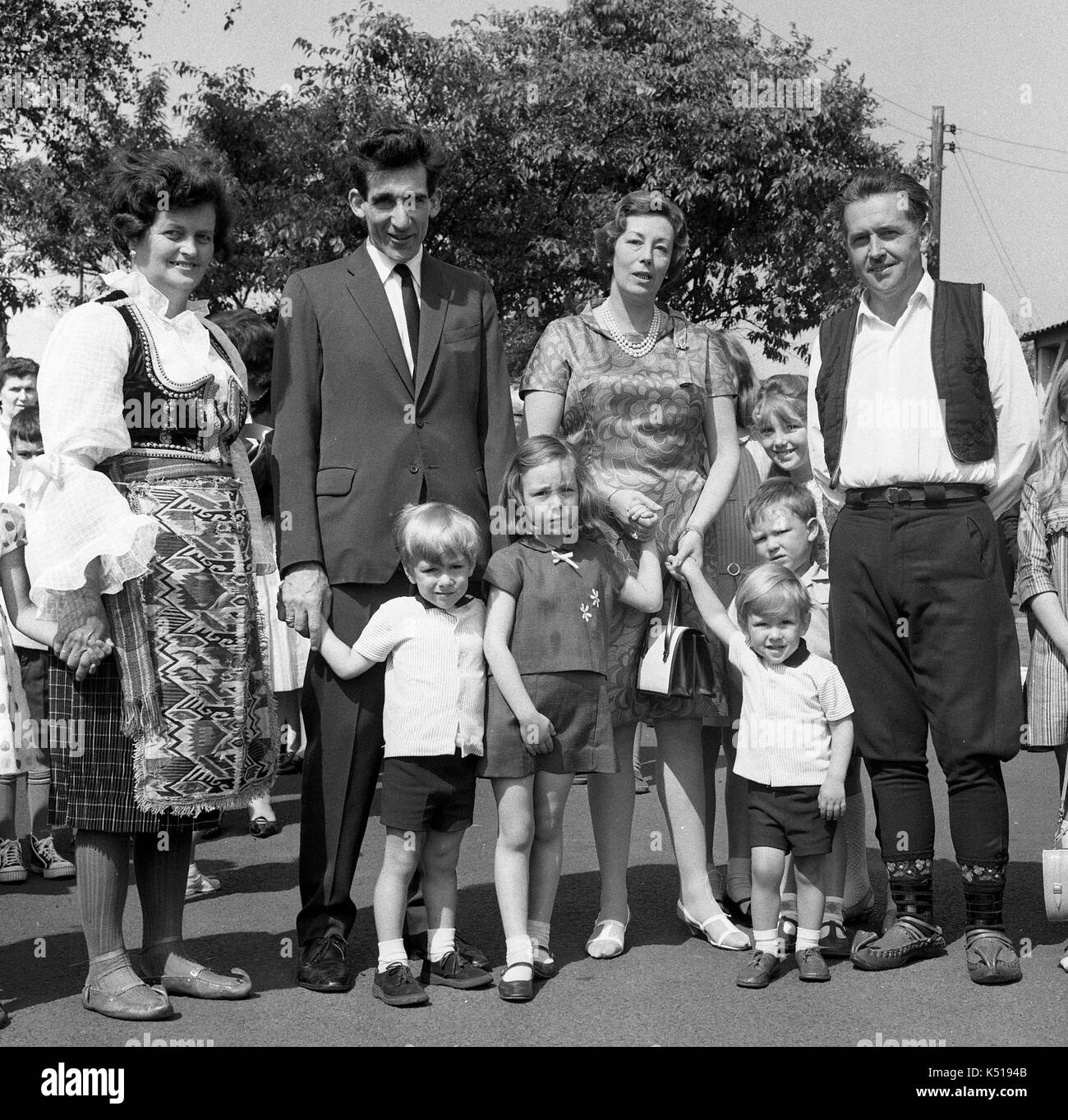 Prince Andreas of Yugoslavia and his wife Princess Kira of Leiningen visiting Serbian Chetniks in traditional costume at a displaced persons camp in England Uk 1968. PICTURE BY DAVID BAGNALL Stock Photo