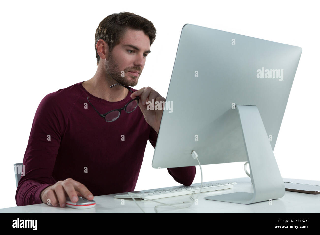 Man using computer against white background Stock Photo - Alamy