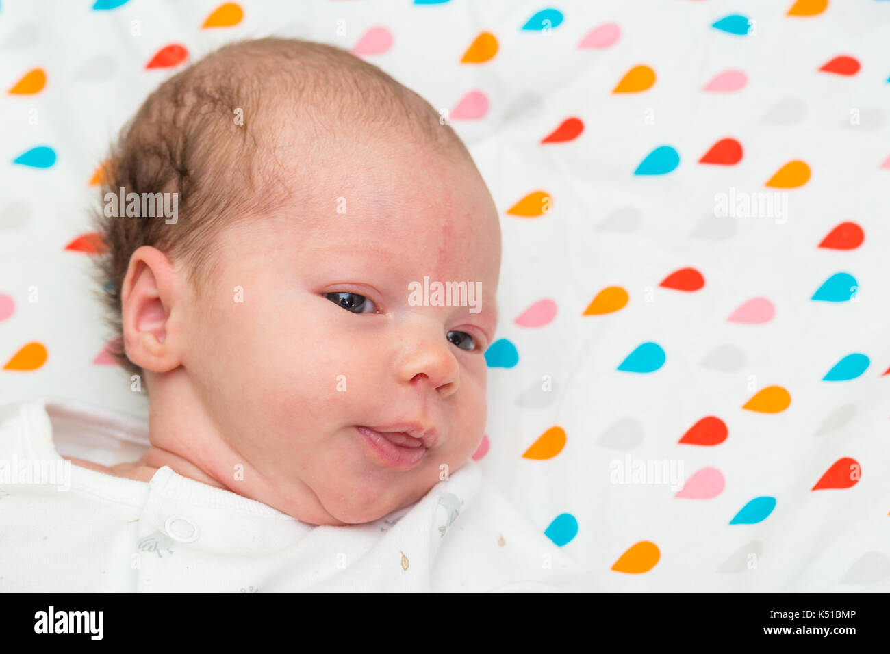 Newborn baby cute infant child open eyes hires stock photography and