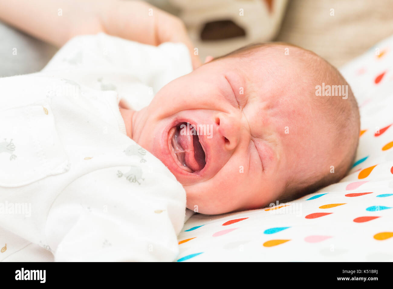 newborn-baby-screaming-in-pain-with-colics-stock-photo-alamy