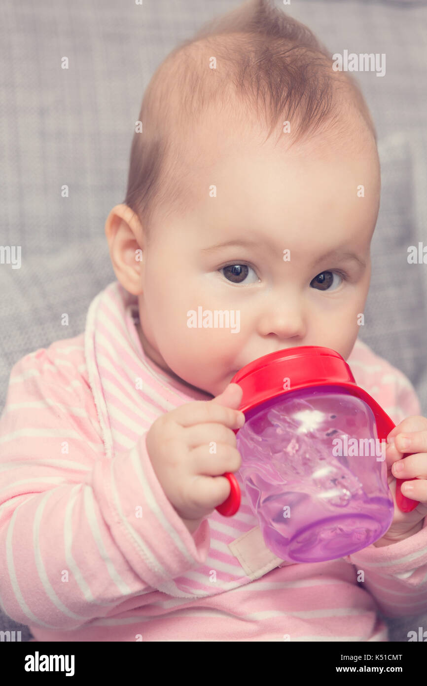 Small kid girl drinking water hires stock photography and images Alamy