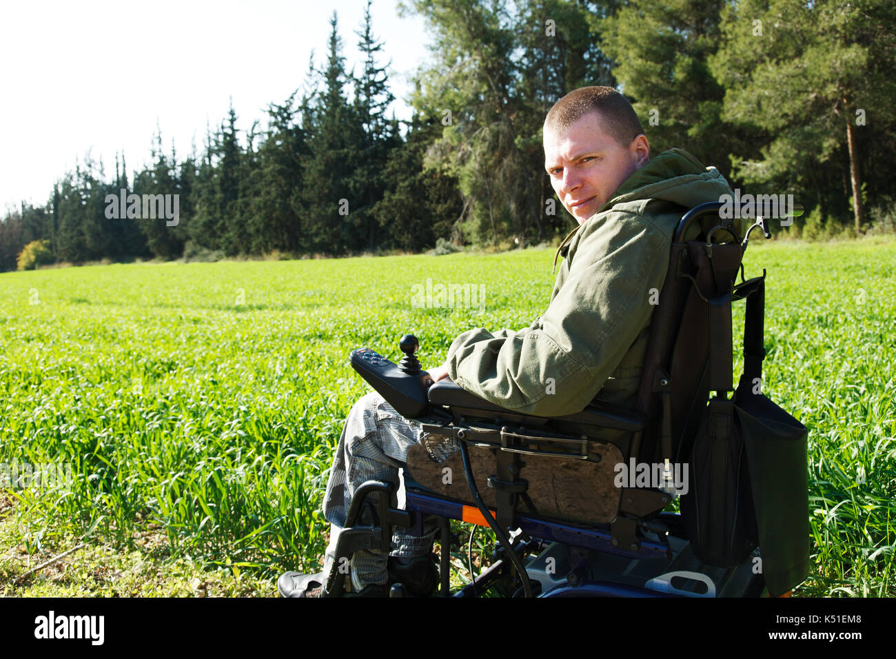 Military soldier being wounded was in a wheelchair. Stock Photo