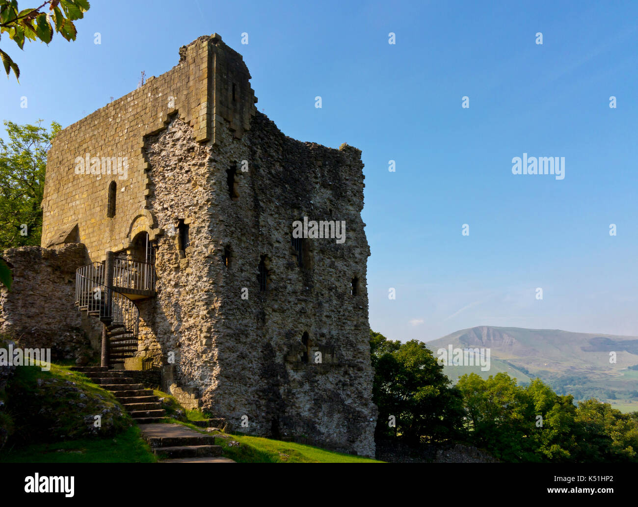 Peveril Castle a ruined 11th century castle overlooking the village of Castleton in the Derbyshire Peak District England UK Stock Photo