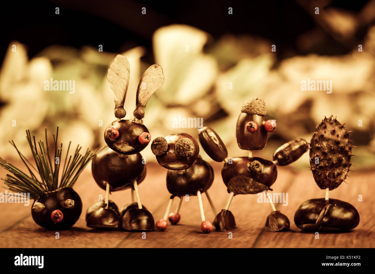 autumn figures made from chestnut fruit with creative concept Stock Photo