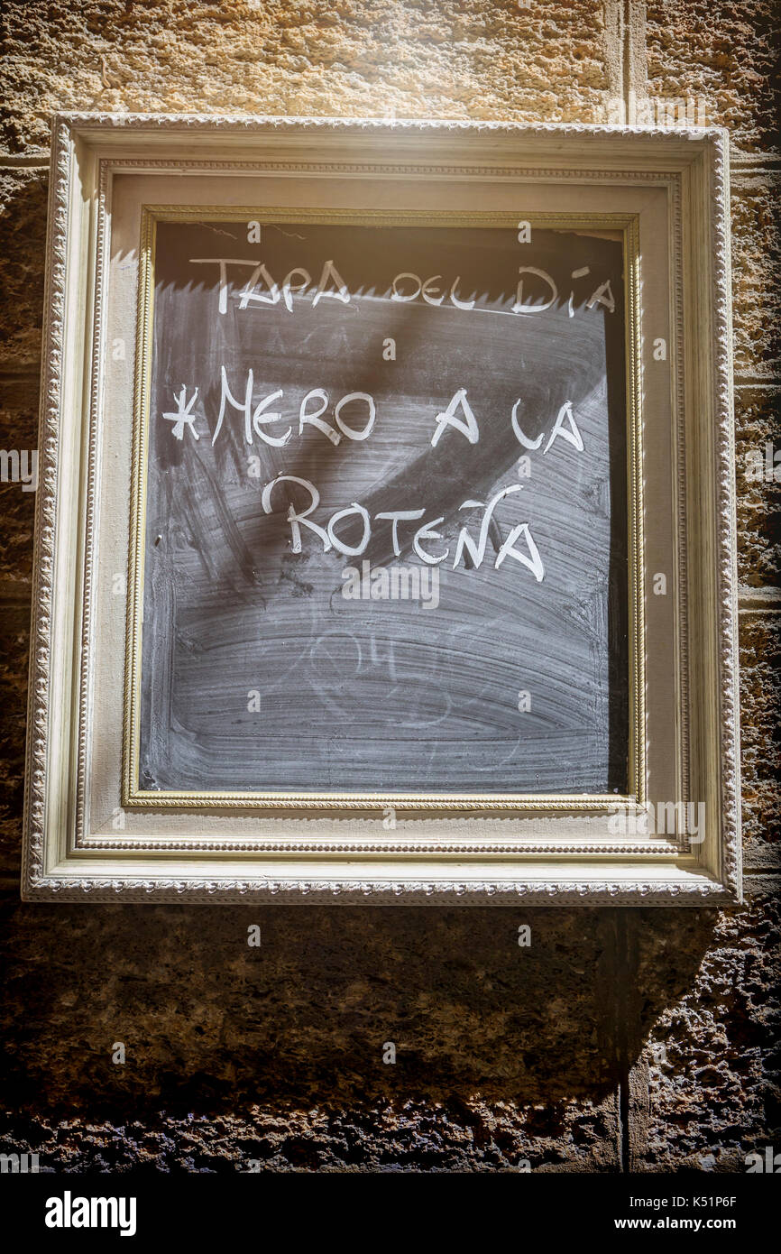 Typical slate at the restaurant door announcing daily menu in Cadiz, Andalusia, Spain Stock Photo