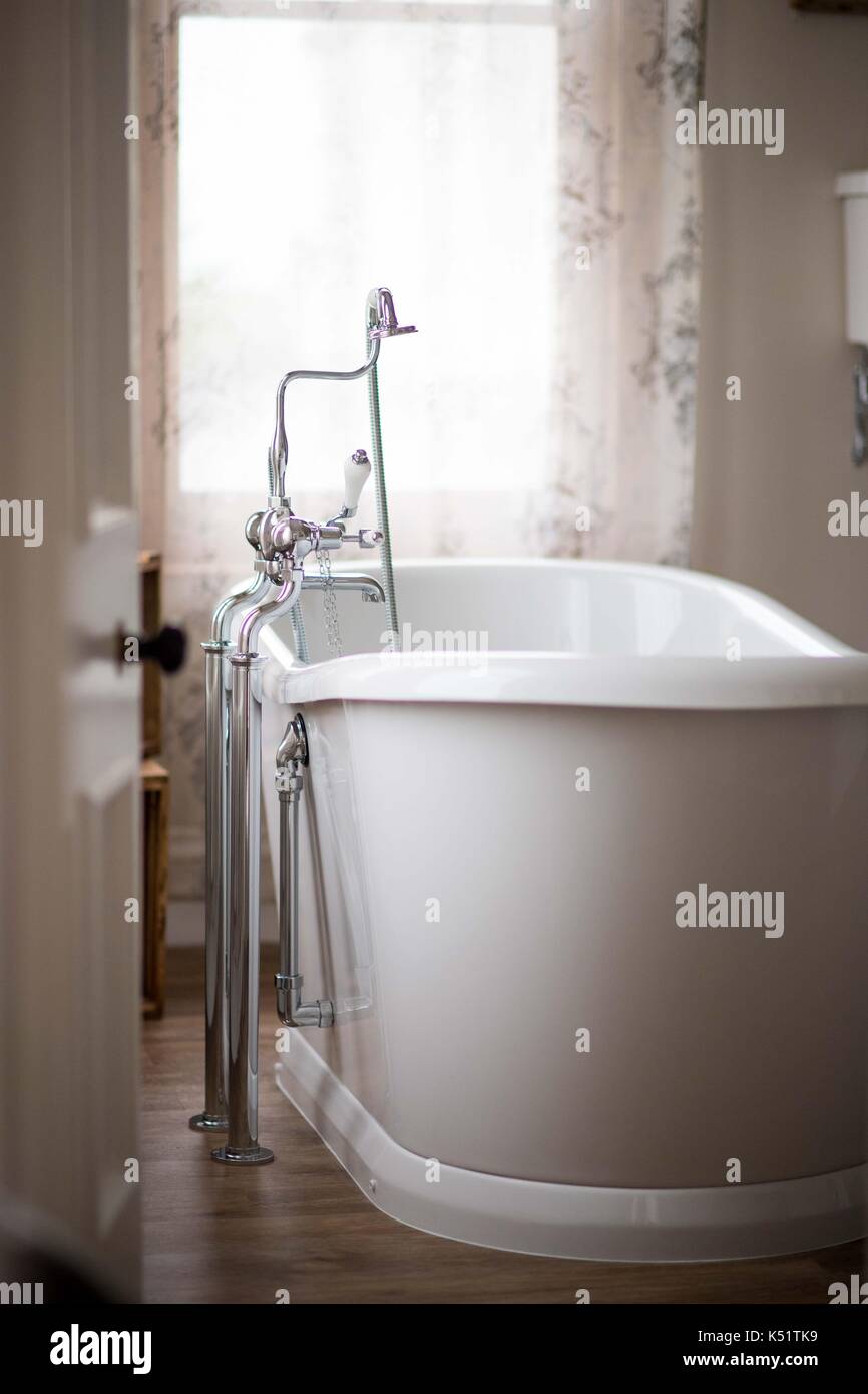 A luxury bathroom with Victorian style bathtub Stock Photo - Alamy