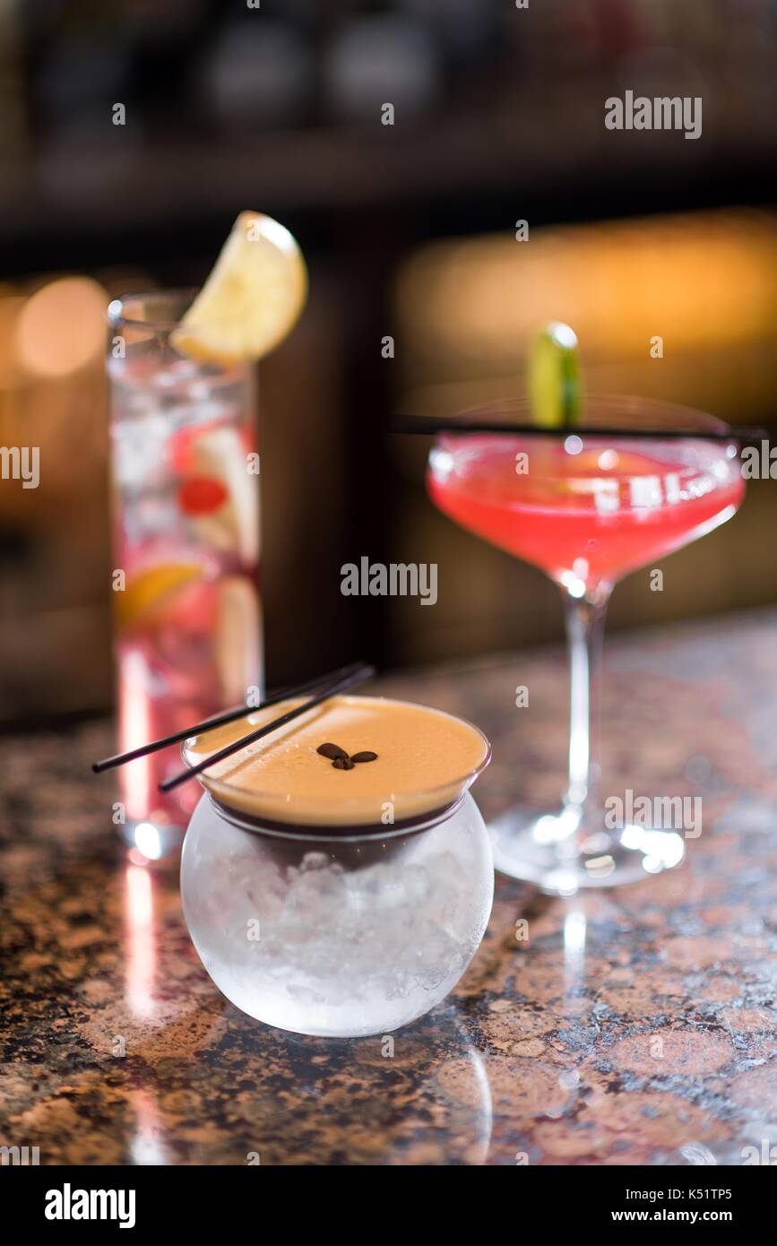 A female bartender pouring a drink Stock Photo